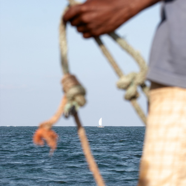 A somalian holding some rope