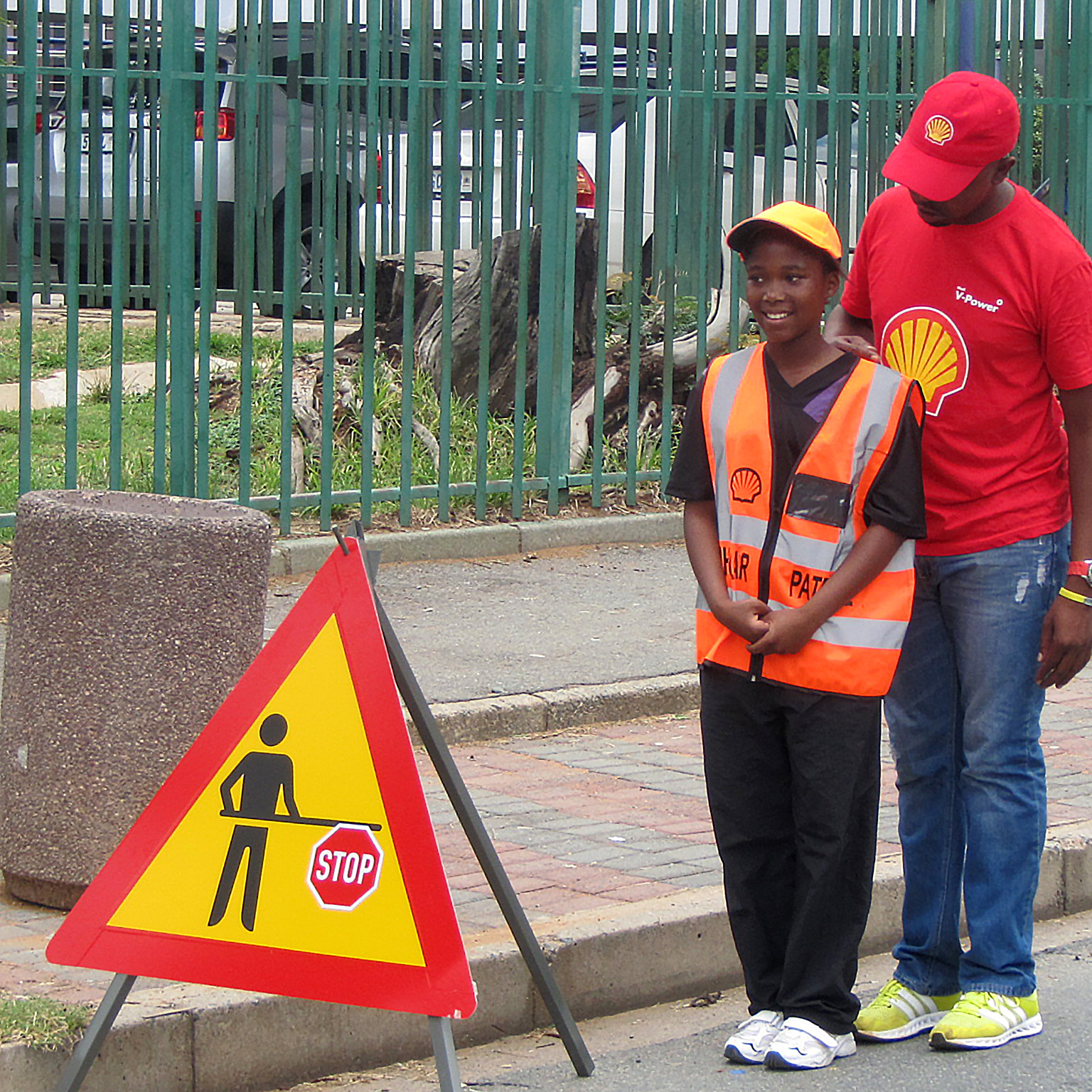 A child being helped safely home in South Africa