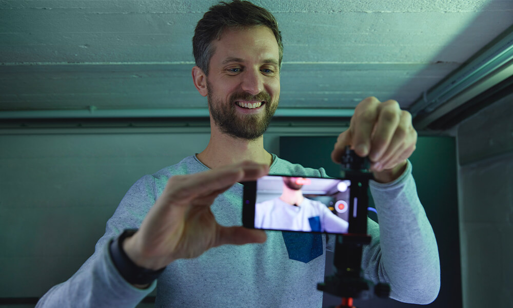Person lying on sunlounger in garden