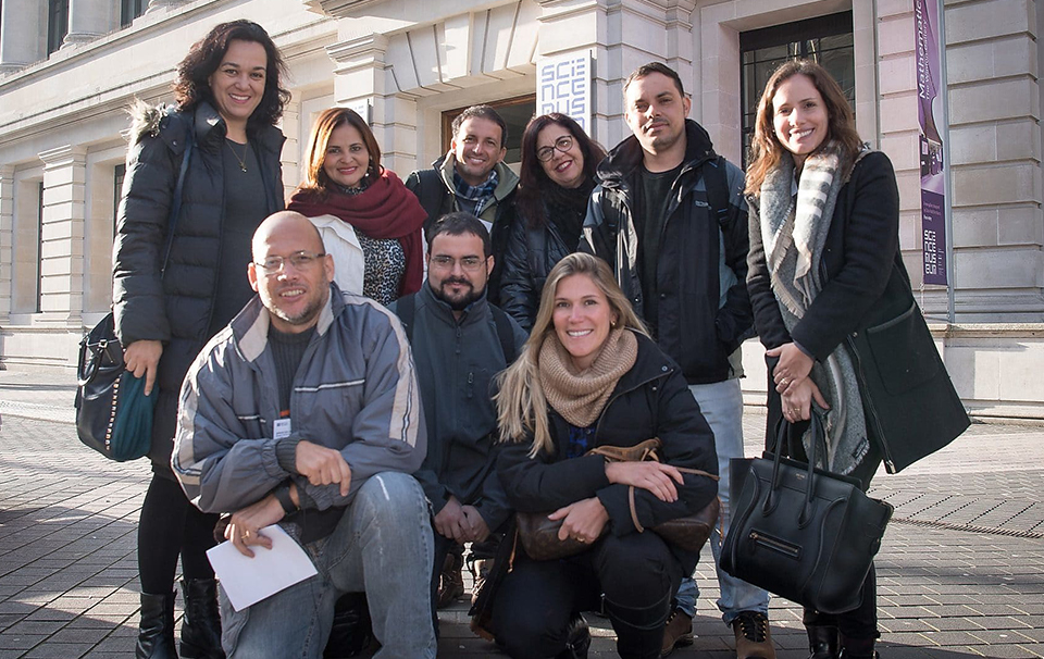 Group of people posing for photo